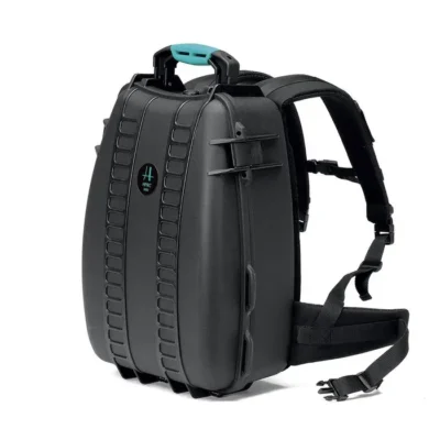 HPRC 3500 black hard resin backpack viewed from a three-quarter angle with teal handle accent
