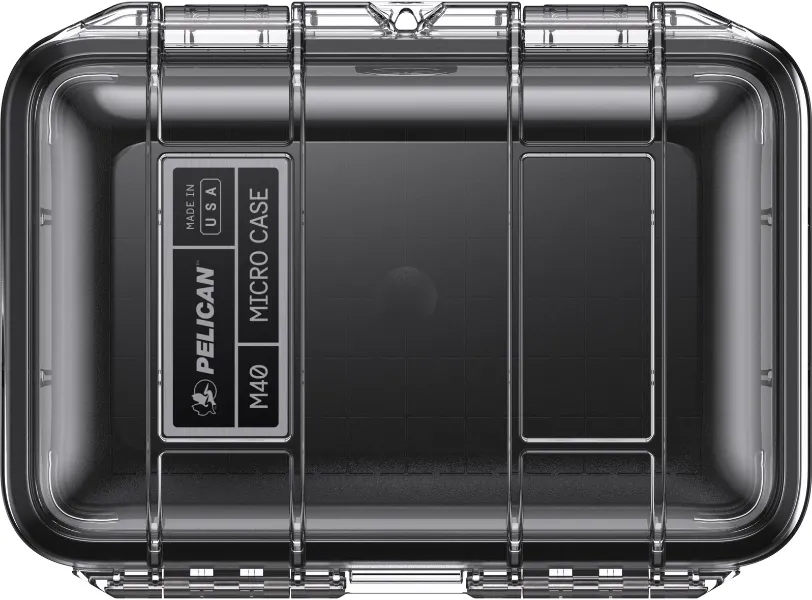 pelican m40 micro case clear black front Top-down view of a clear Pelican M40 Micro Case featuring a black interior liner