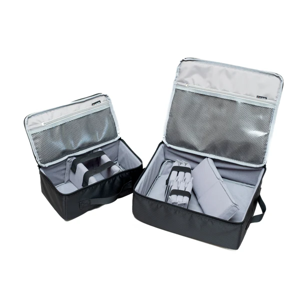 in1519tr 7 Two black A-MoDe travel insert bags with open lids showing grey padded dividers