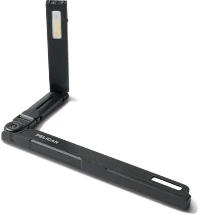 Matte black Pelican ModLight Pivot flashlight with a pivoting head angled upward on white background